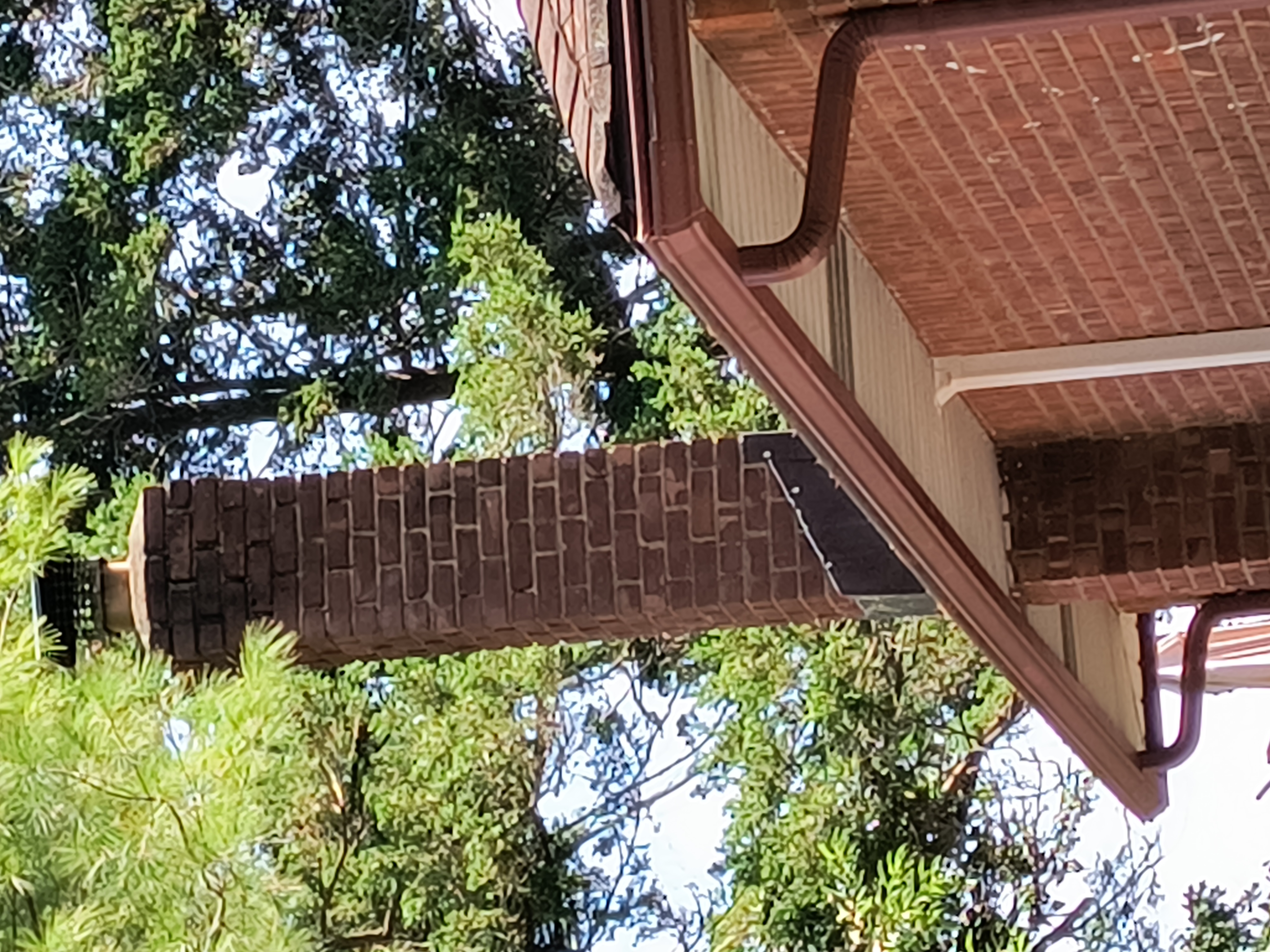 Before and after professional chimney cleaning in Rockville Centre, NY