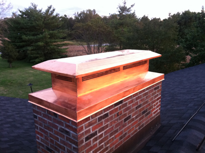 Before and after chimney cap replacement in Rockville Centre, NY