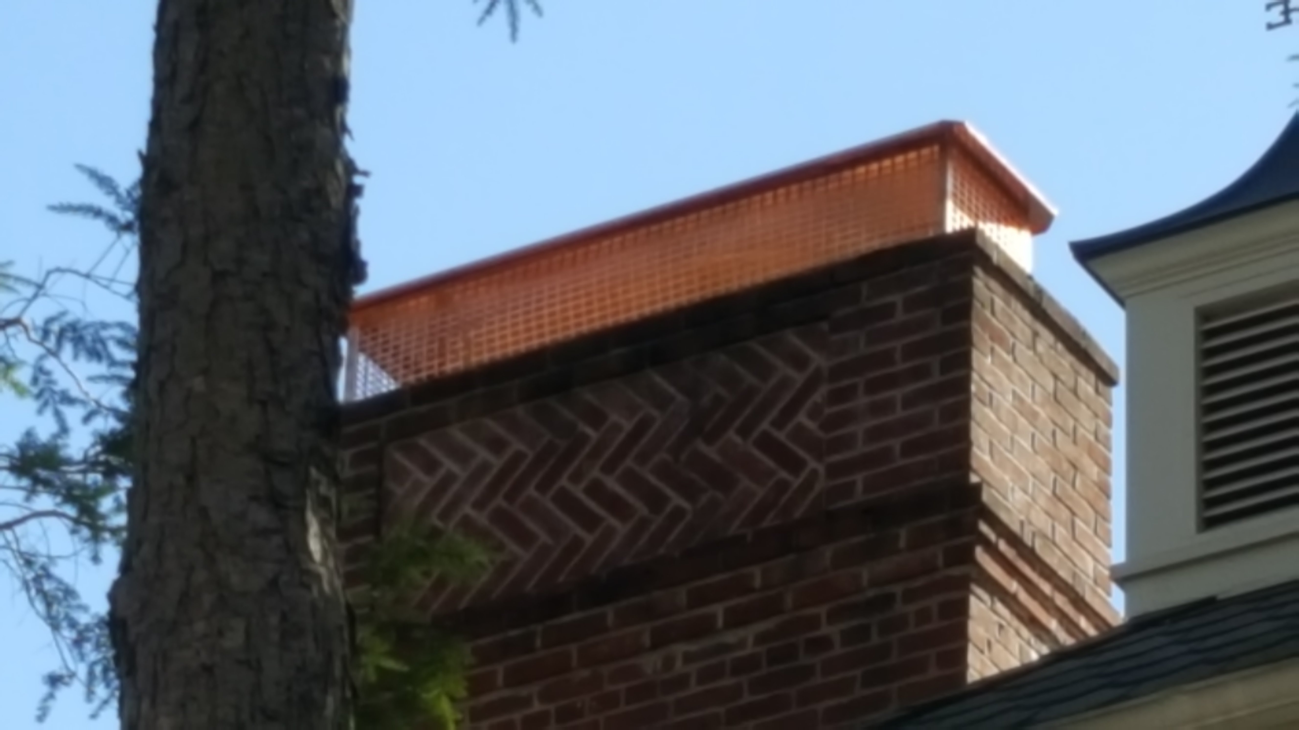 New stainless steel chimney cap installed in Rockville Centre, NY