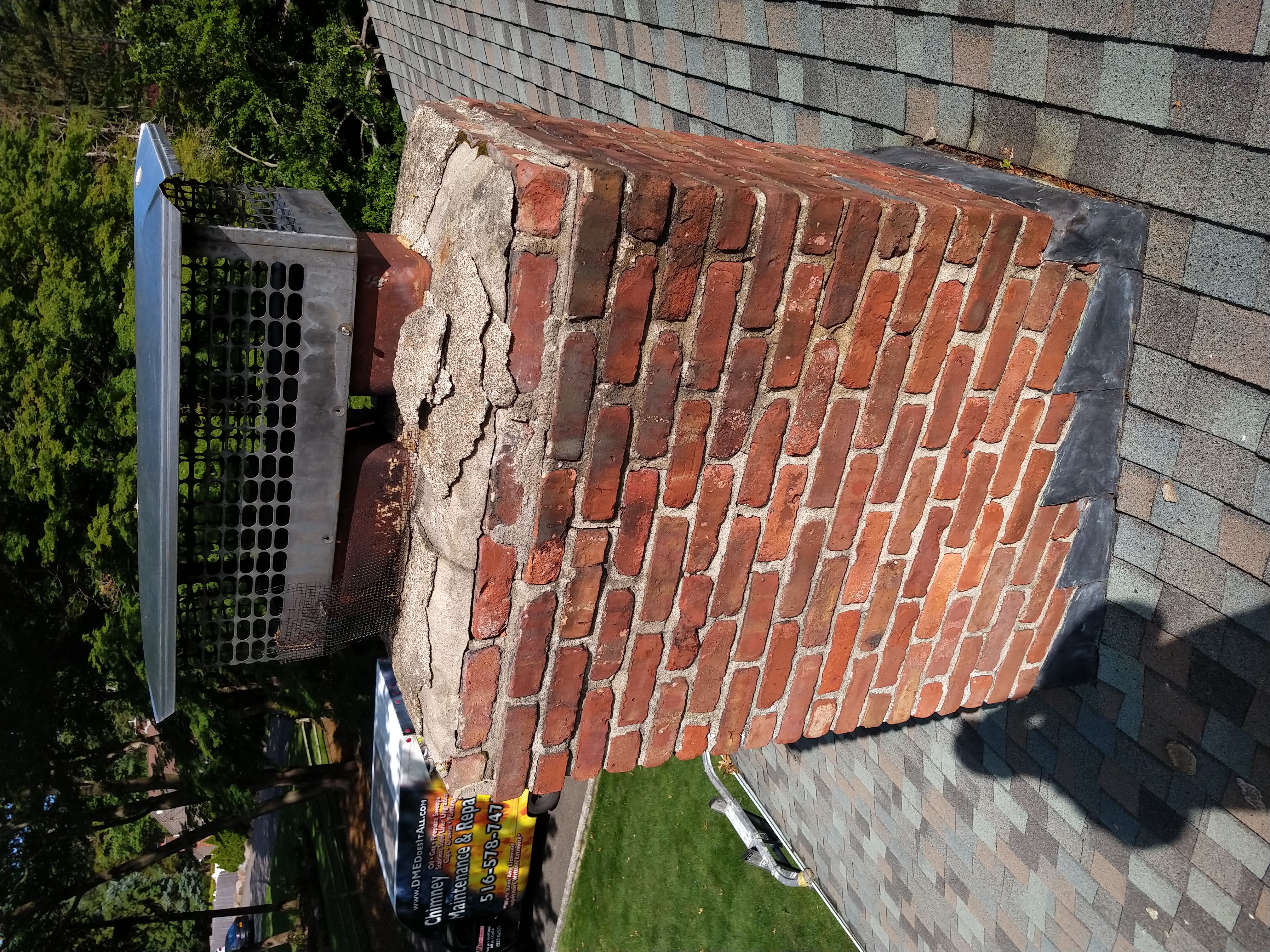 Before and after chimney pointing and tuckpointing in Rockville Centre, NY