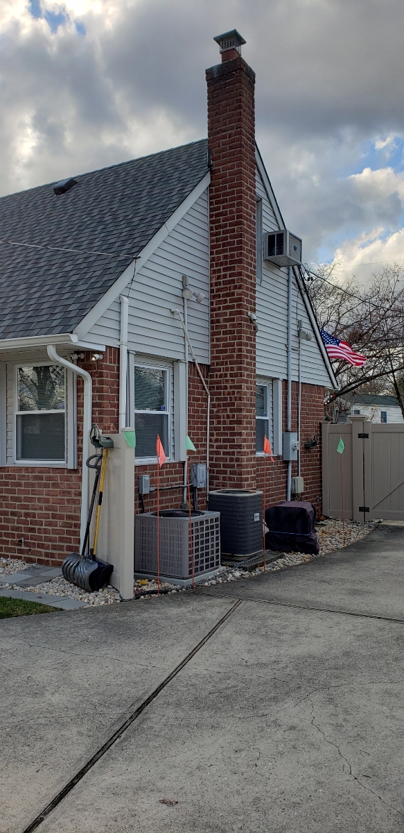 Professional chimney repointing restoring brick joints in Rockville Centre, NY